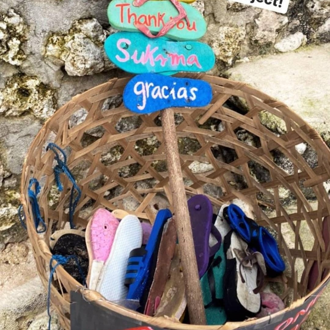Basket of old flip flops and shoes ready for recycling in Singapore