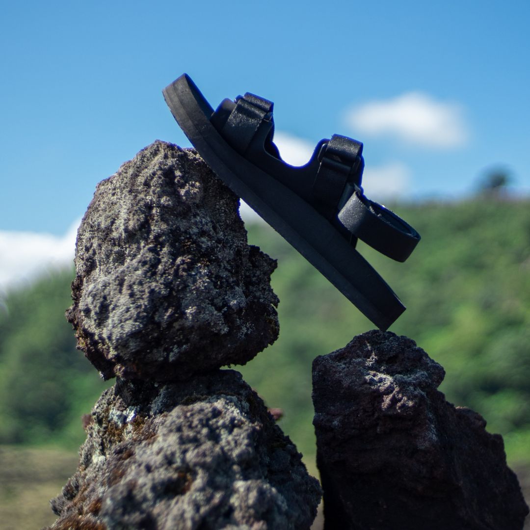 Black Hijack Indosole Sandals on a Rock