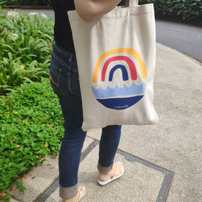 A woman wearing tote bag