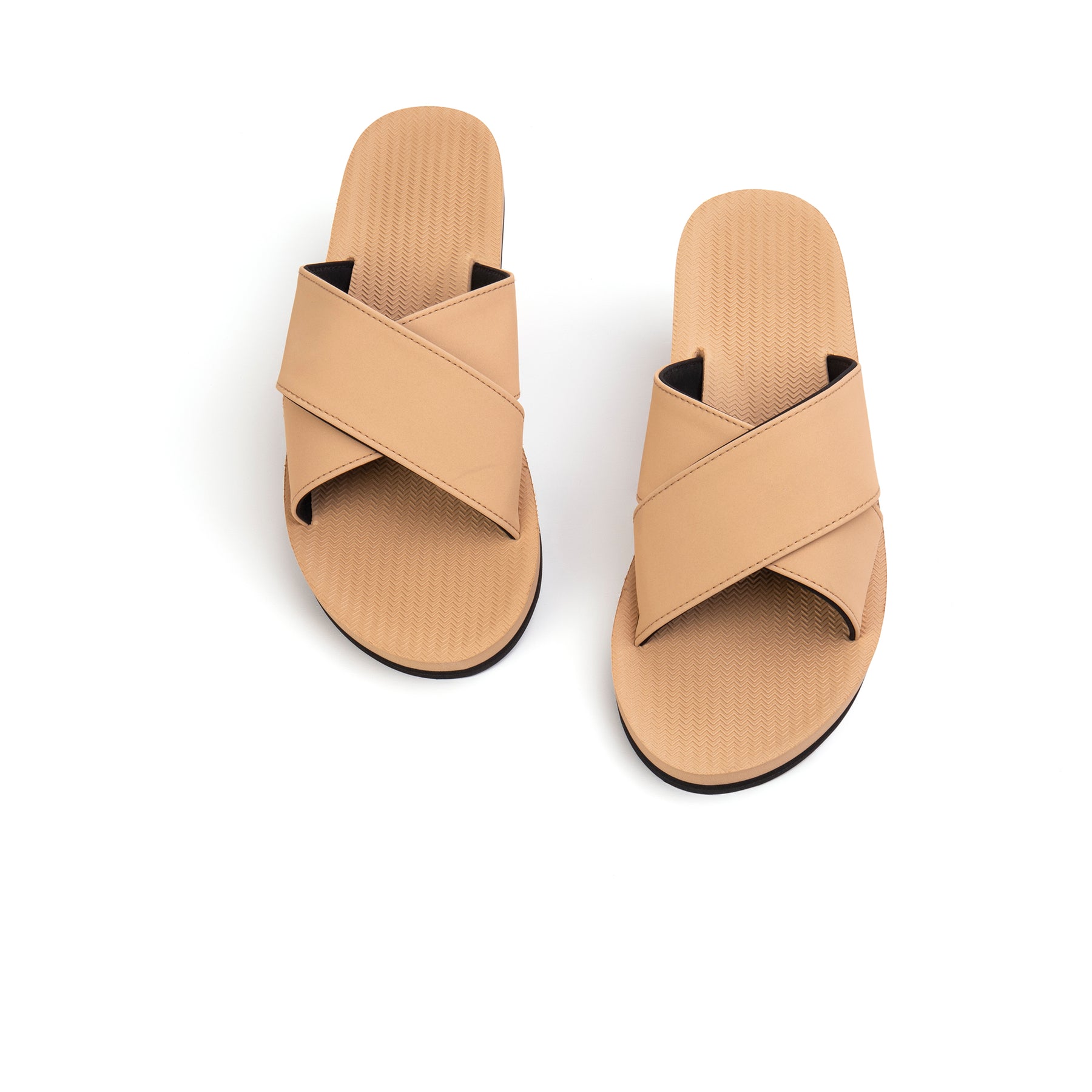 A pair of men’s light soil cross sandals