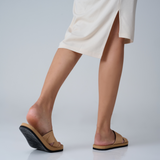 Cross sandals in light soil color