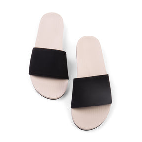 A pair of sea salt/black men's slides